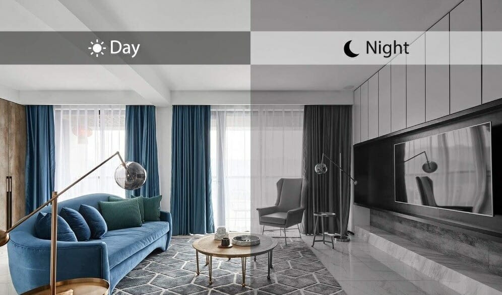 A surveillance camera captures a living room with a blue couch and tv.